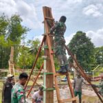 Pengabdian Satgas Yonif 762/VYS Gotong Royong Bangun Masjid Bersama Masyarakat